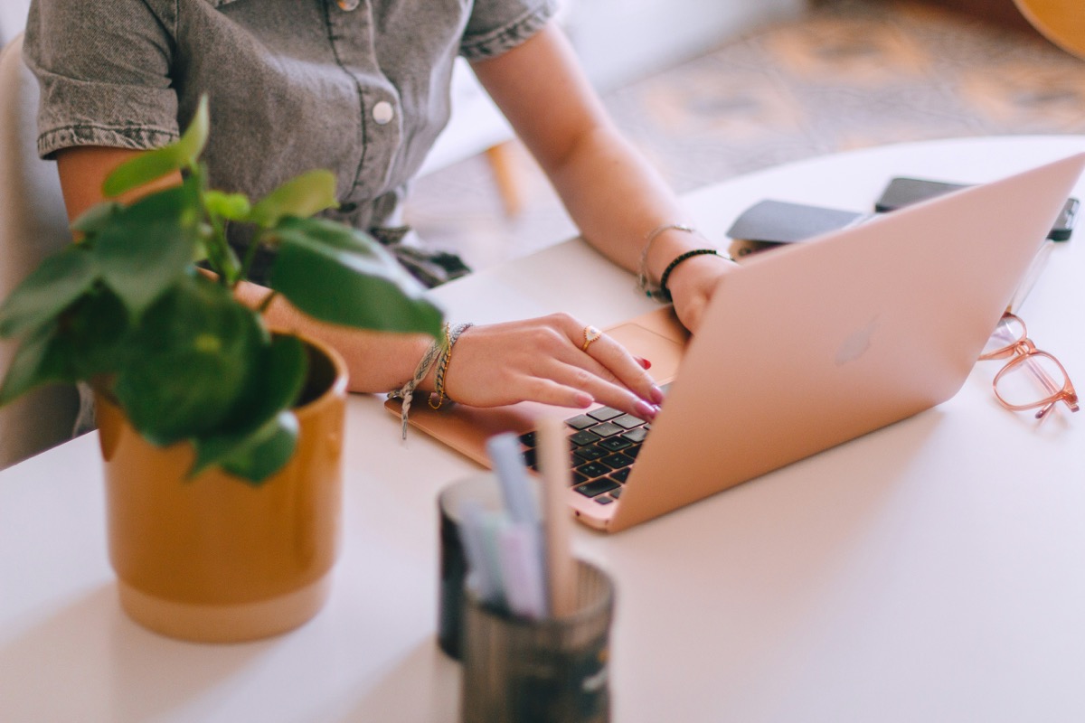 Therapist at desk writing therapy progress notes faster
